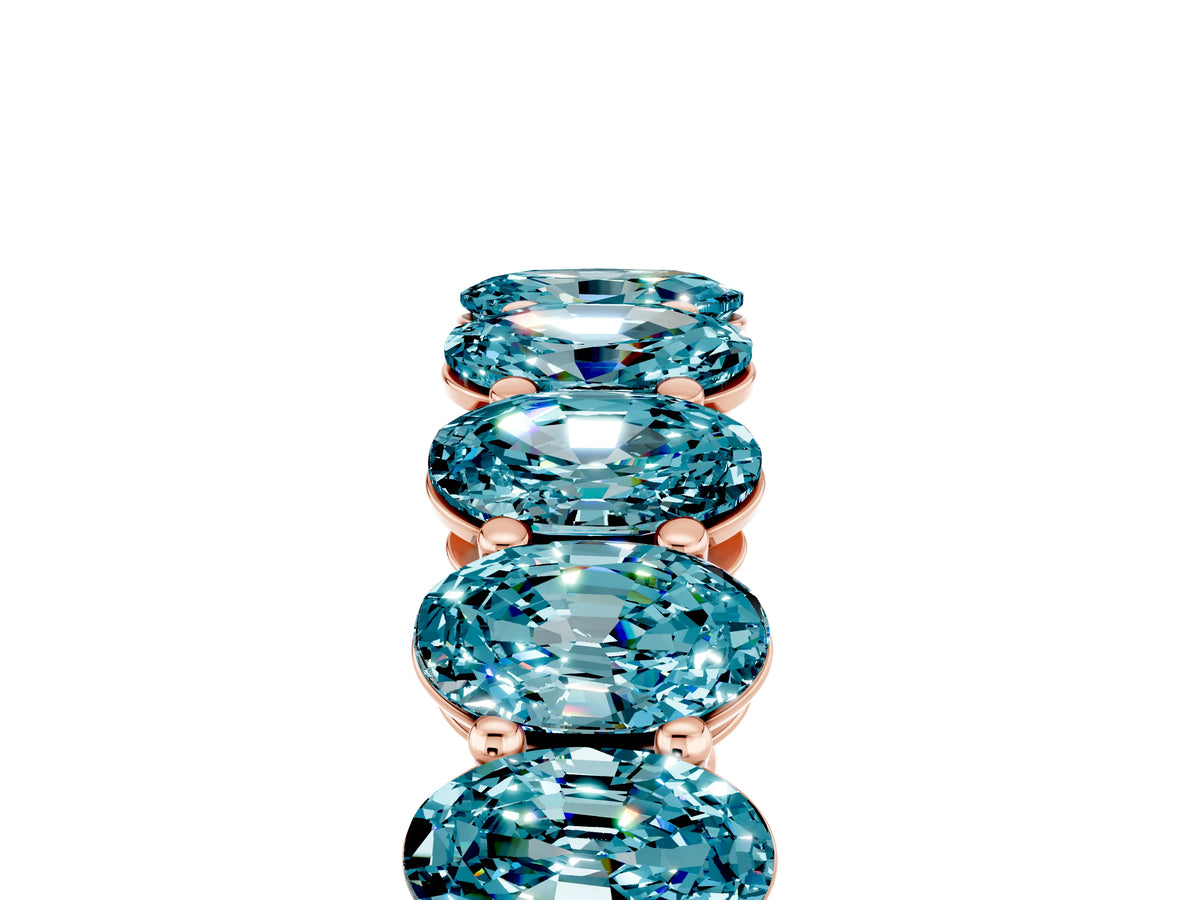 Oval Cut Blue Topaz Eternity Band in Rose gold with Shared Prong Setting_5