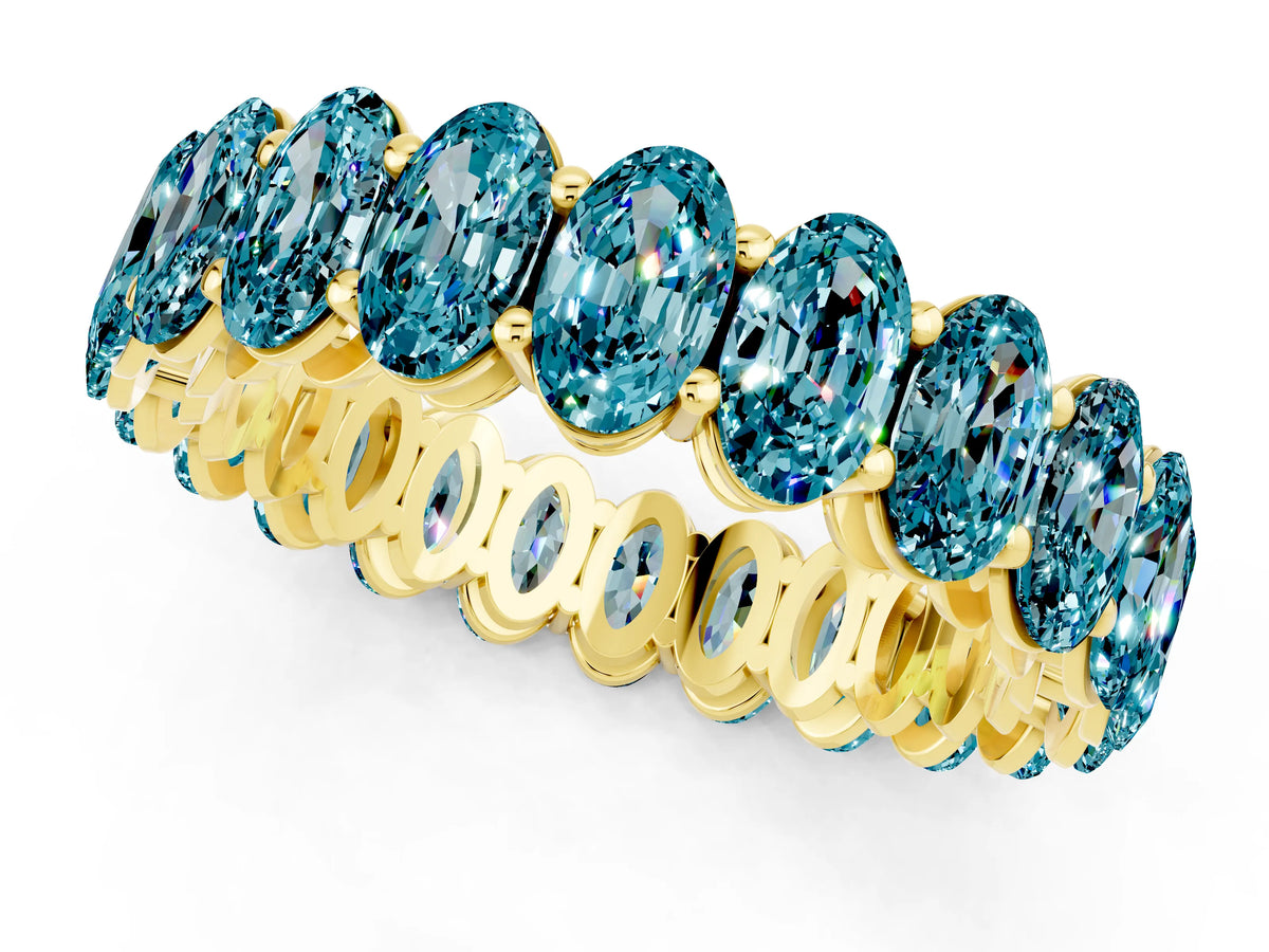 Oval Cut Blue Topaz Eternity Band in Yellow gold with Shared Prong Setting_1