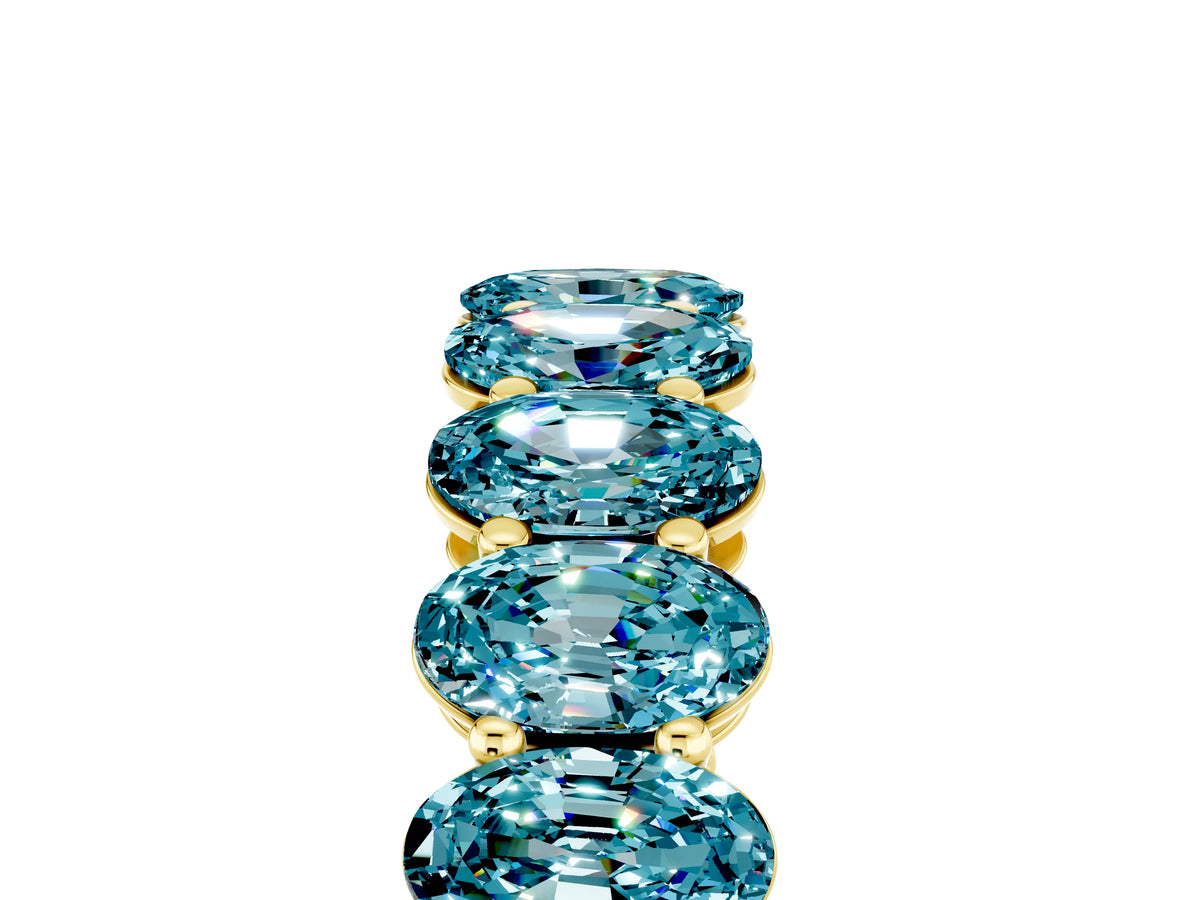Oval Cut Blue Topaz Eternity Band in Yellow gold with Shared Prong Setting_5