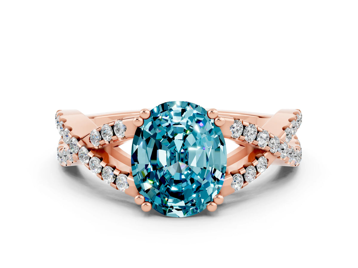 Oval Cut Blue Topaz Solitaire Ring in Rose gold with Interwoven Pavé Band and Prong Setting