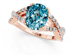 Oval Cut Blue Topaz Solitaire Ring in Rose gold with Interwoven Pavé Band and Prong Setting_1