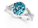 Oval Cut Blue Topaz Solitaire Ring in Silver with Interwoven Pavé Band and Prong Setting_7