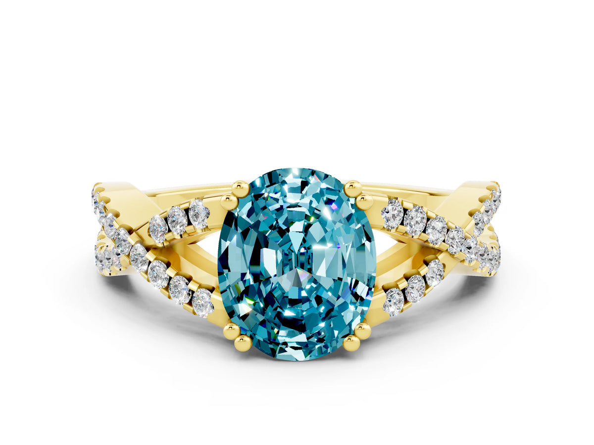Oval Cut Blue Topaz Solitaire Ring in Yellow gold with Interwoven Pavé Band and Prong Setting