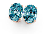 Oval Cut Blue Topaz Stud Earrings in Rose gold with Basket Setting_1
