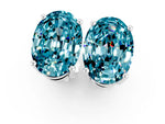 Oval Cut Blue Topaz Stud Earrings in White gold with Basket Setting_1