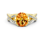 Oval Cut Citrine Solitaire Ring in Yellow gold with Interwoven Pavé Band and Prong Setting