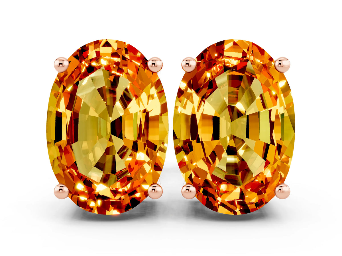Oval Cut Citrine Stud Earrings in Rose gold with Basket Setting