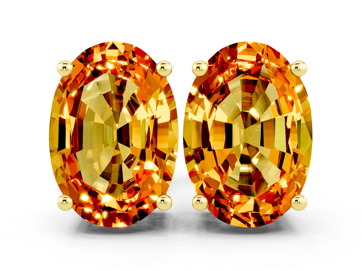 Oval Cut Citrine Stud Earrings in Yellow gold with Basket Setting