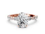 Oval Cut Diamond Solitaire Ring in Rose gold with Shared Prong Marquise and Round Side Stones_12