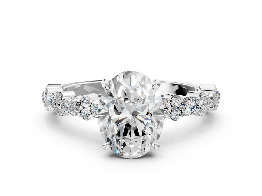 Oval Cut Diamond Solitaire Ring in White gold with Pear and Round Cluster Band