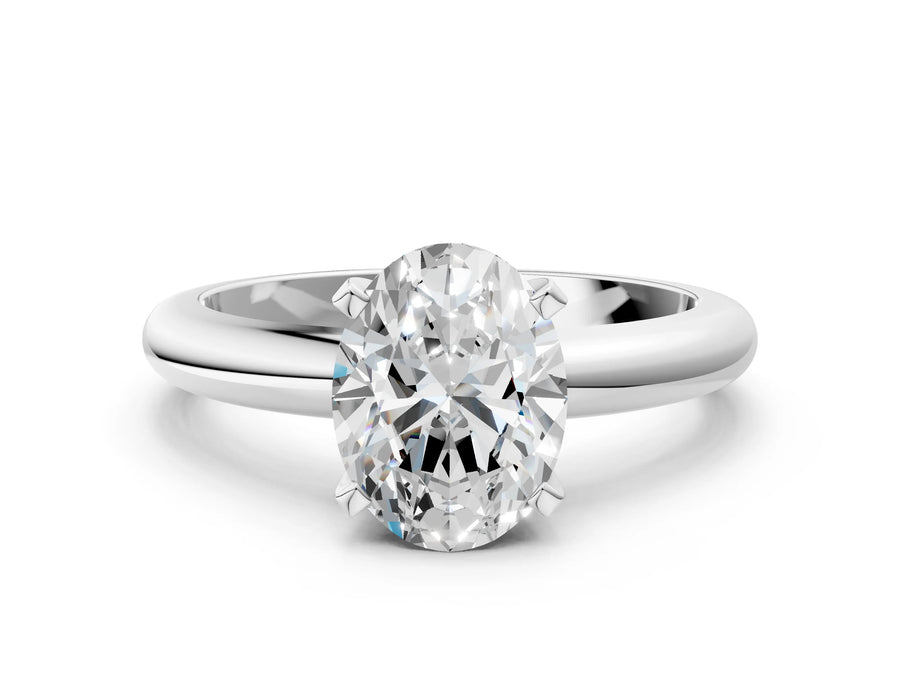 Oval Cut Diamond Solitaire Ring in White gold with Prong Setting and Rounded Band