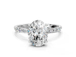Oval Cut Diamond Solitaire Ring in White gold with Round Pavé Band_24