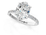 Oval Cut Diamond Solitaire Ring in White gold with Round Pavé Band_25