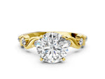 Oval Cut Diamond Solitaire Ring in Yellow gold with Twisted Ribbon Band and Round Accents