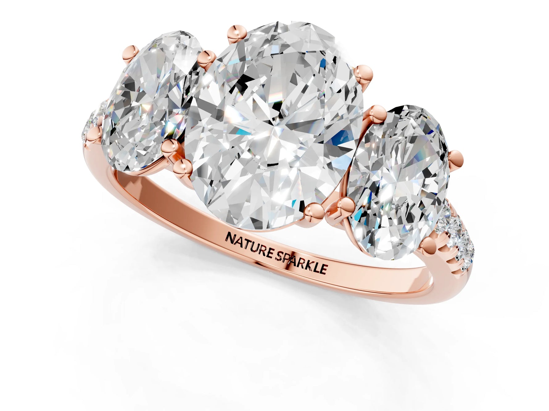 Oval Cut Diamond Trellis Three-Stone Engagement Ring in Rose gold with Round Side Stones_19