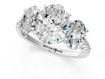 Oval Cut Diamond Trellis Three-Stone Engagement Ring in White gold with Round Side Stones_19