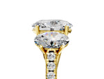 Oval Cut Diamond Trellis Three-Stone Engagement Ring in Yellow gold with Round Side Stones_23
