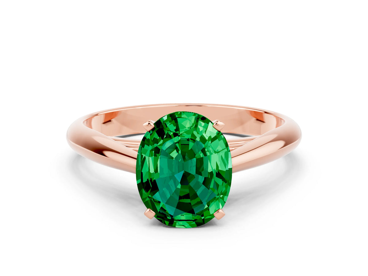 Oval Cut Emerald Cathedral Solitaire Engagement Ring in Rose gold with Prong Setting