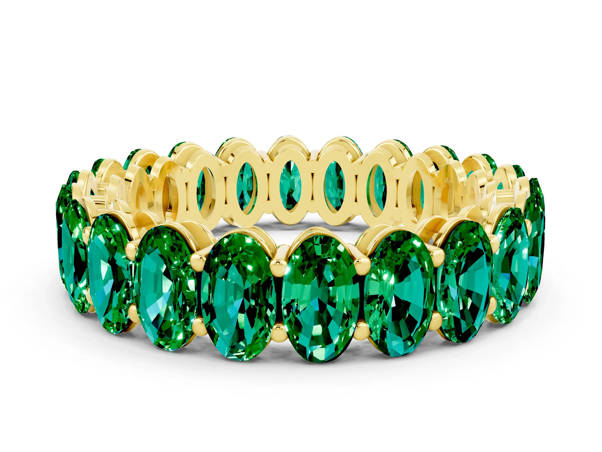 Oval Cut Emerald Eternity Band in Yellow gold with Shared Prong Setting