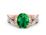 Oval Cut Emerald Solitaire Ring in Rose gold with Interwoven Pavé Band and Prong Setting