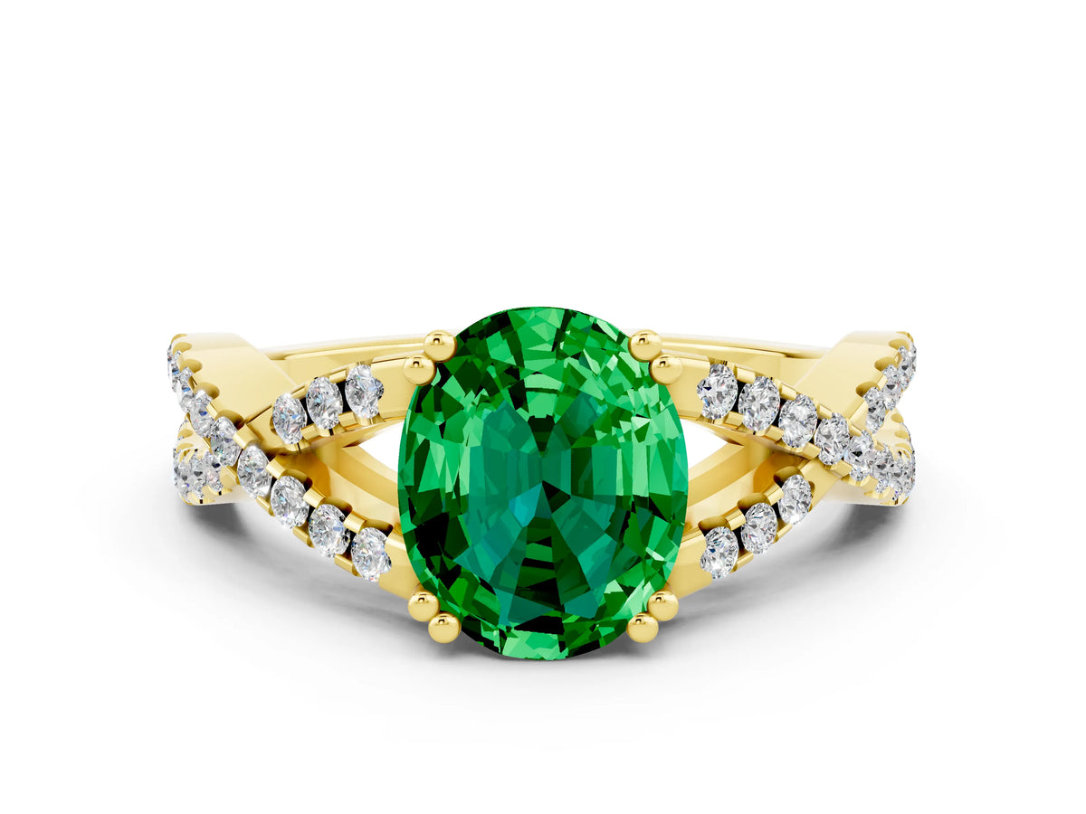 Oval Cut Emerald Solitaire Ring in Yellow gold with Interwoven Pavé Band and Prong Setting