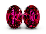 Oval Cut Garnet Stud Earrings in White gold with Basket Setting