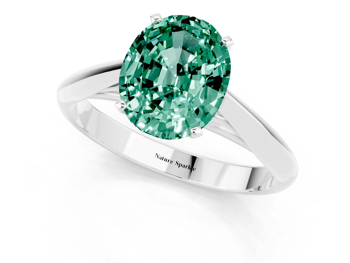 Oval Cut Green Sapphire Cathedral Solitaire Engagement Ring in Silver with Prong Setting_1