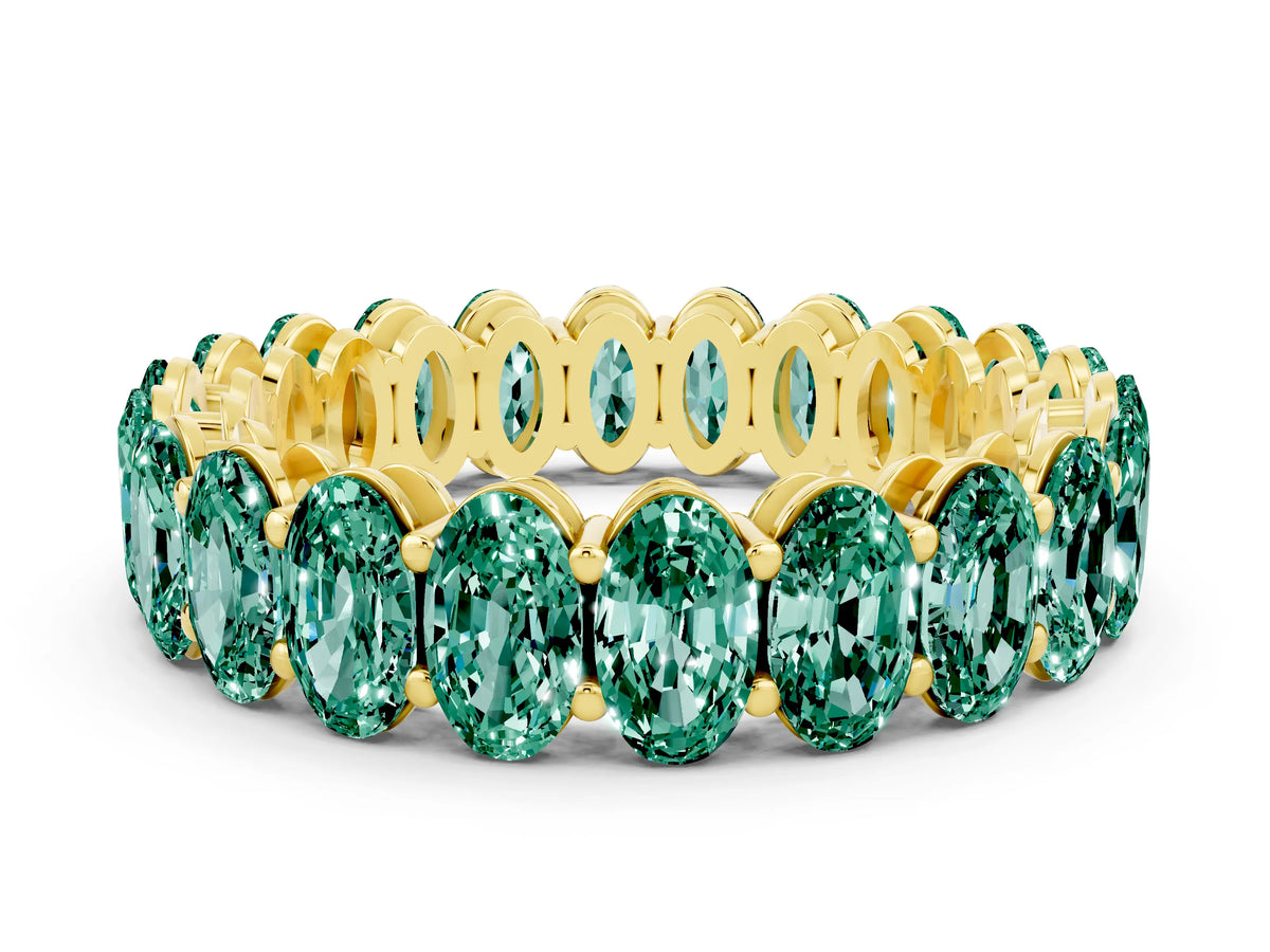 Oval Cut Green Sapphire Eternity Band in Yellow gold with Shared Prong Setting