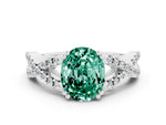 Oval Cut Green Sapphire Solitaire Ring in White gold with Interwoven Pavé Band and Prong Setting