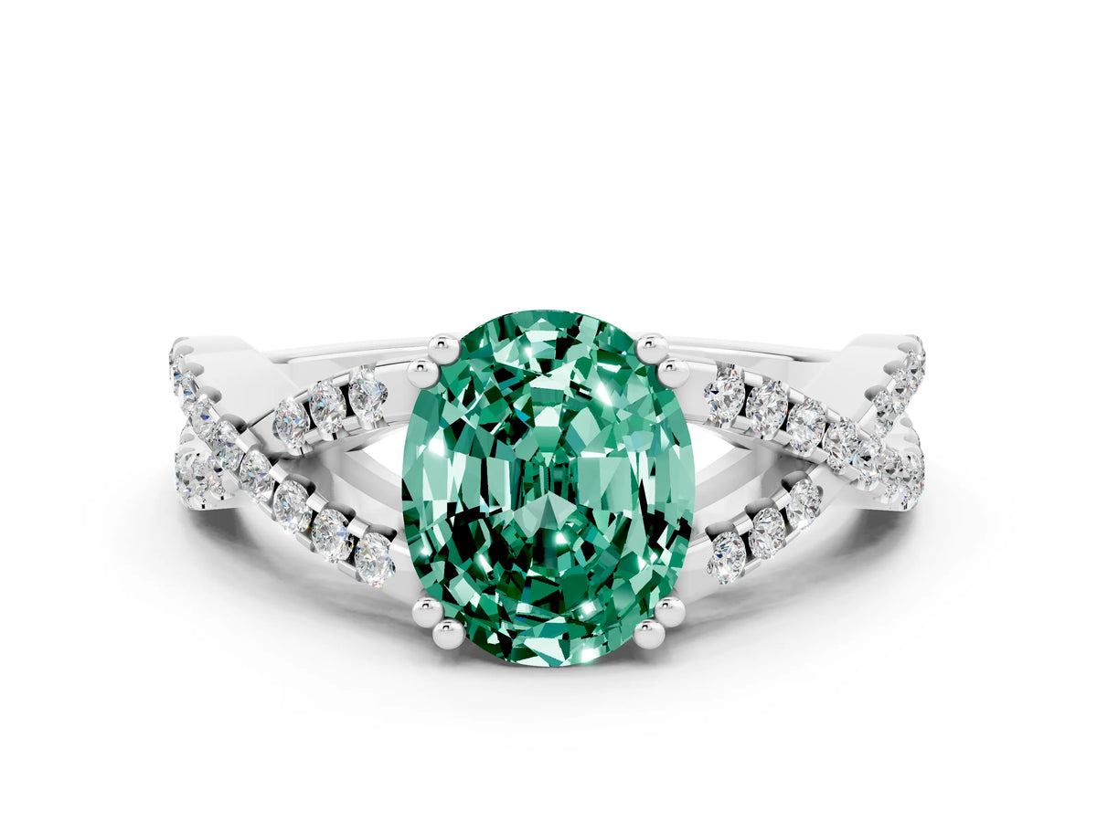 Oval Cut Green Sapphire Solitaire Ring in White gold with Interwoven Pavé Band and Prong Setting