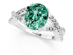Oval Cut Green Sapphire Solitaire Ring in White gold with Interwoven Pavé Band and Prong Setting_1