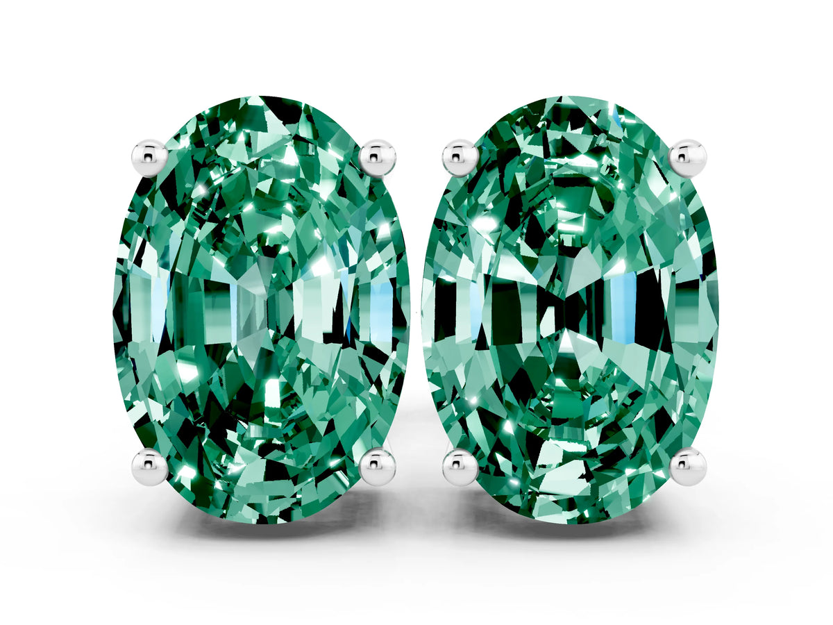Oval Cut Green Sapphire Stud Earrings in White gold with Basket Setting