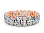 Oval Cut Moissanite Eternity Band in Rose gold with Shared Prong Setting