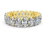 Oval Cut Moissanite Eternity Band in Yellow gold with Shared Prong Setting
