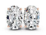 Oval Cut Moissanite Stud Earrings in Rose gold with Basket Setting