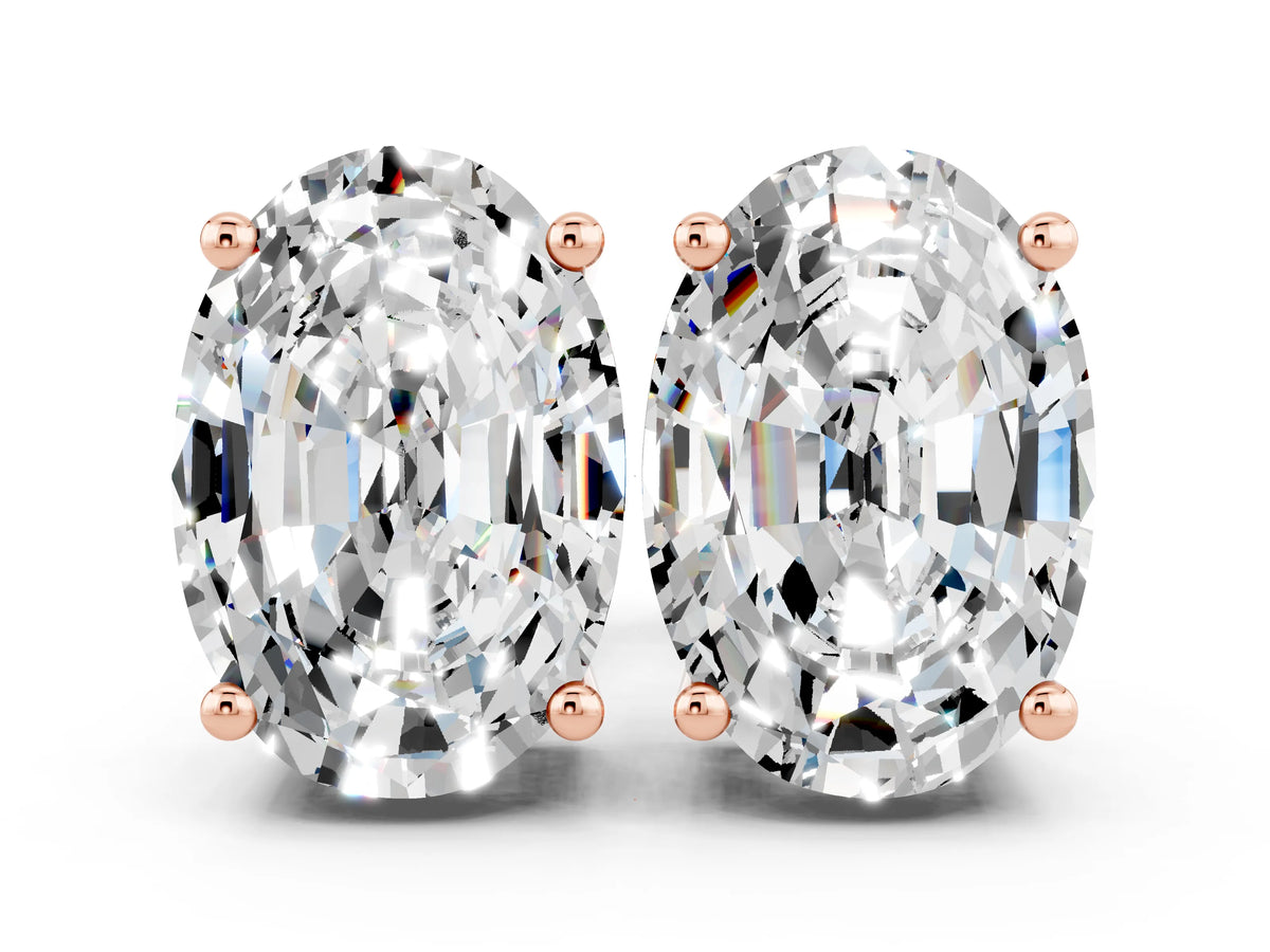 Oval Cut Moissanite Stud Earrings in Rose gold with Basket Setting