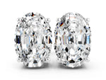 Oval Cut Moissanite Stud Earrings in White gold with Basket Setting