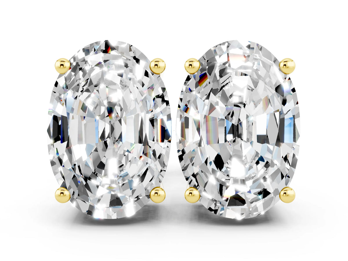 Oval Cut Moissanite Stud Earrings in Yellow gold with Basket Setting