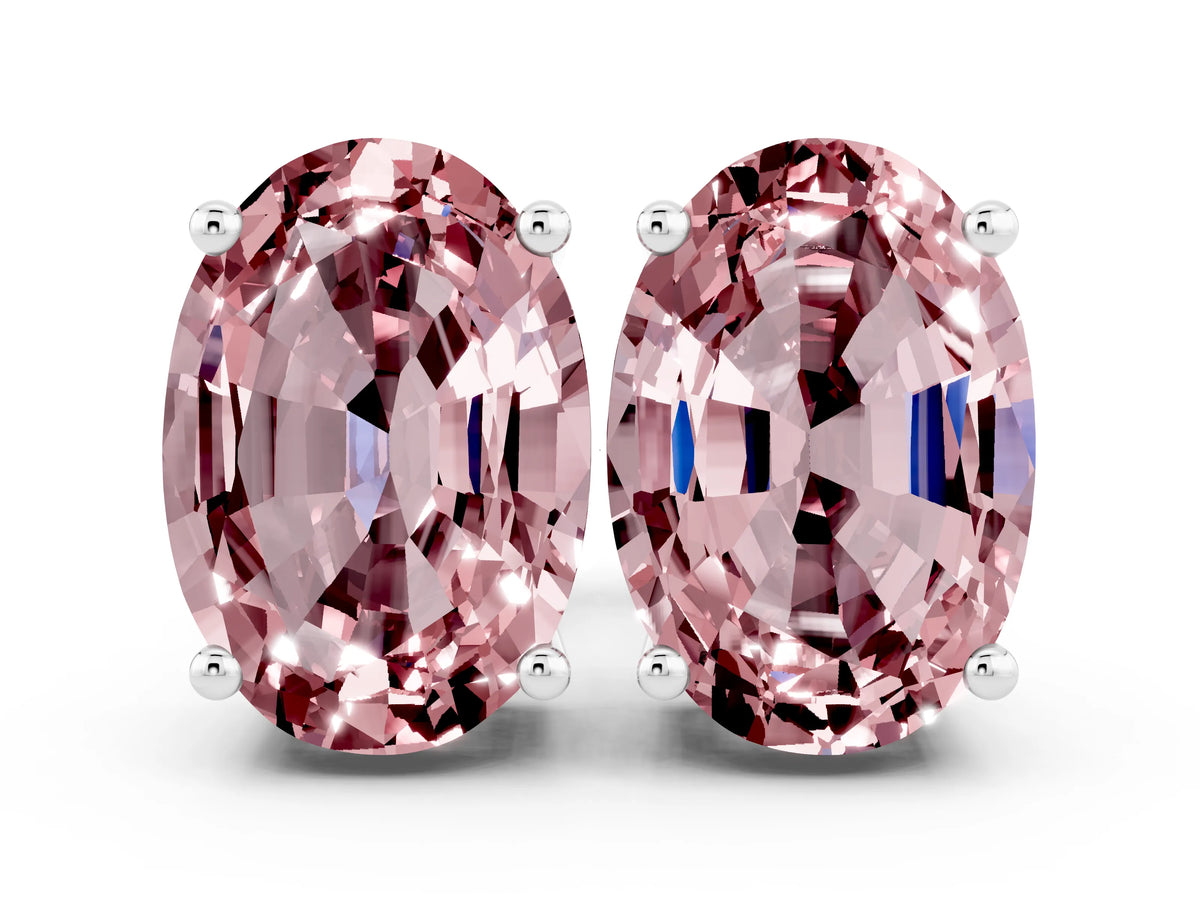 Oval Cut Morganite Stud Earrings in White gold with Basket Setting
