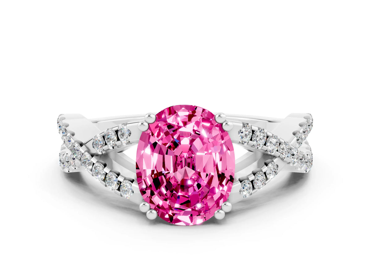 Oval Cut Pink Sapphire Solitaire Ring in White gold with Interwoven Pavé Band and Prong Setting