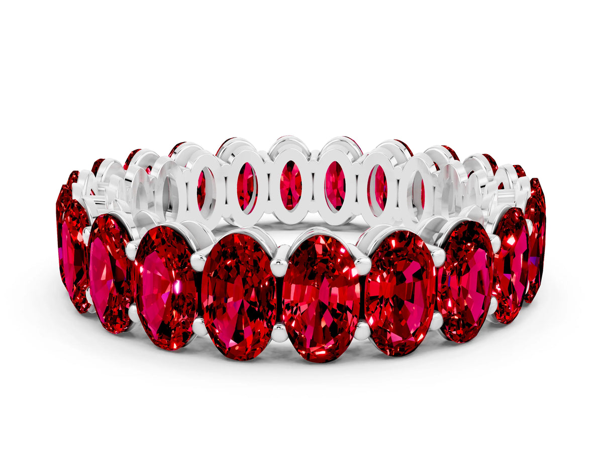 Oval Cut Ruby Eternity Band in Platinum with Shared Prong Setting