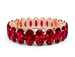 Oval Cut Ruby Eternity Band in Rose gold with Shared Prong Setting