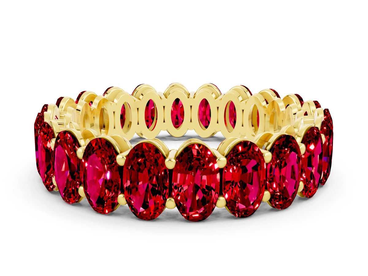 Oval Cut Ruby Eternity Band in Yellow gold with Shared Prong Setting