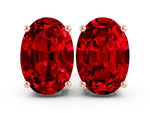 Oval Cut Ruby Stud Earrings in Rose gold with Basket Setting