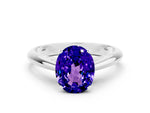 Oval Cut Tanzanite Cathedral Solitaire Engagement Ring in Platinum with Prong Setting