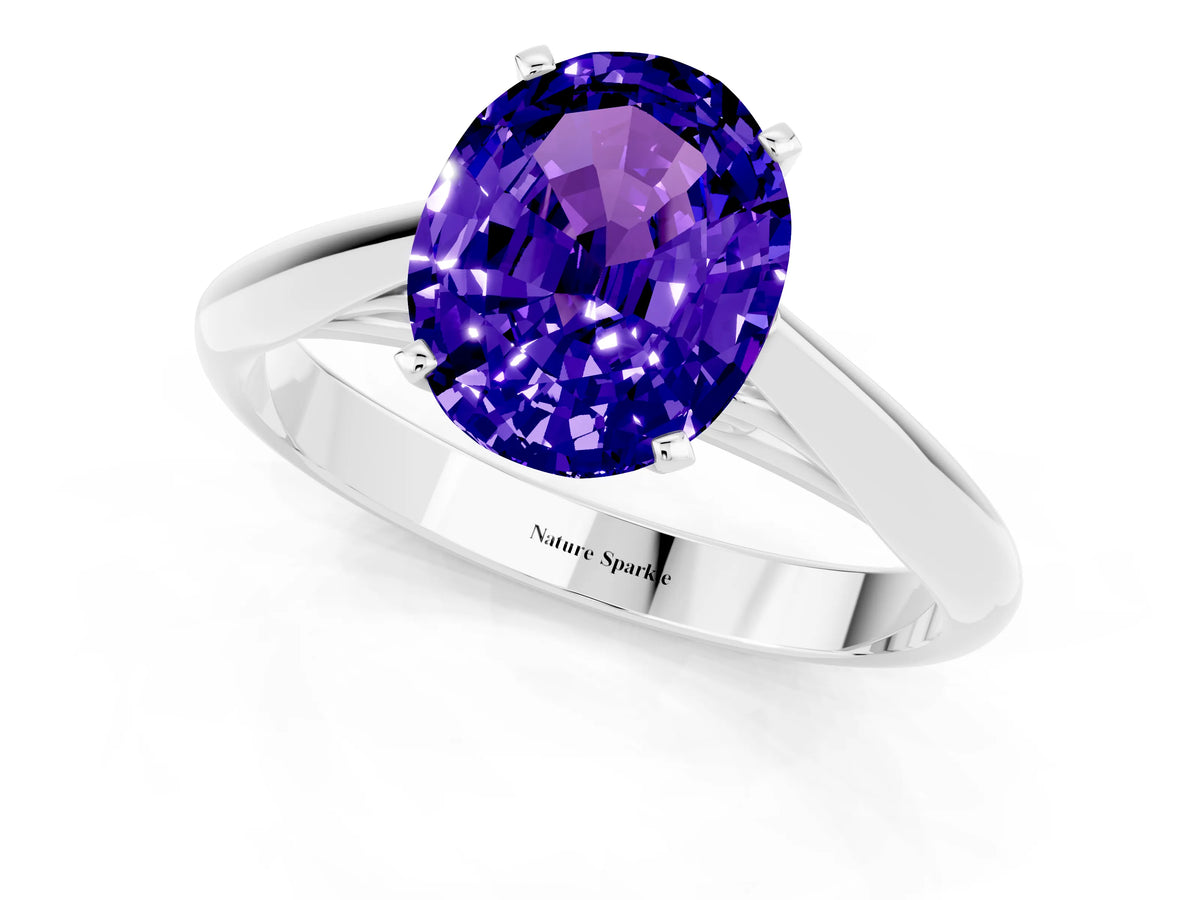Oval Cut Tanzanite Cathedral Solitaire Engagement Ring in Platinum with Prong Setting_1