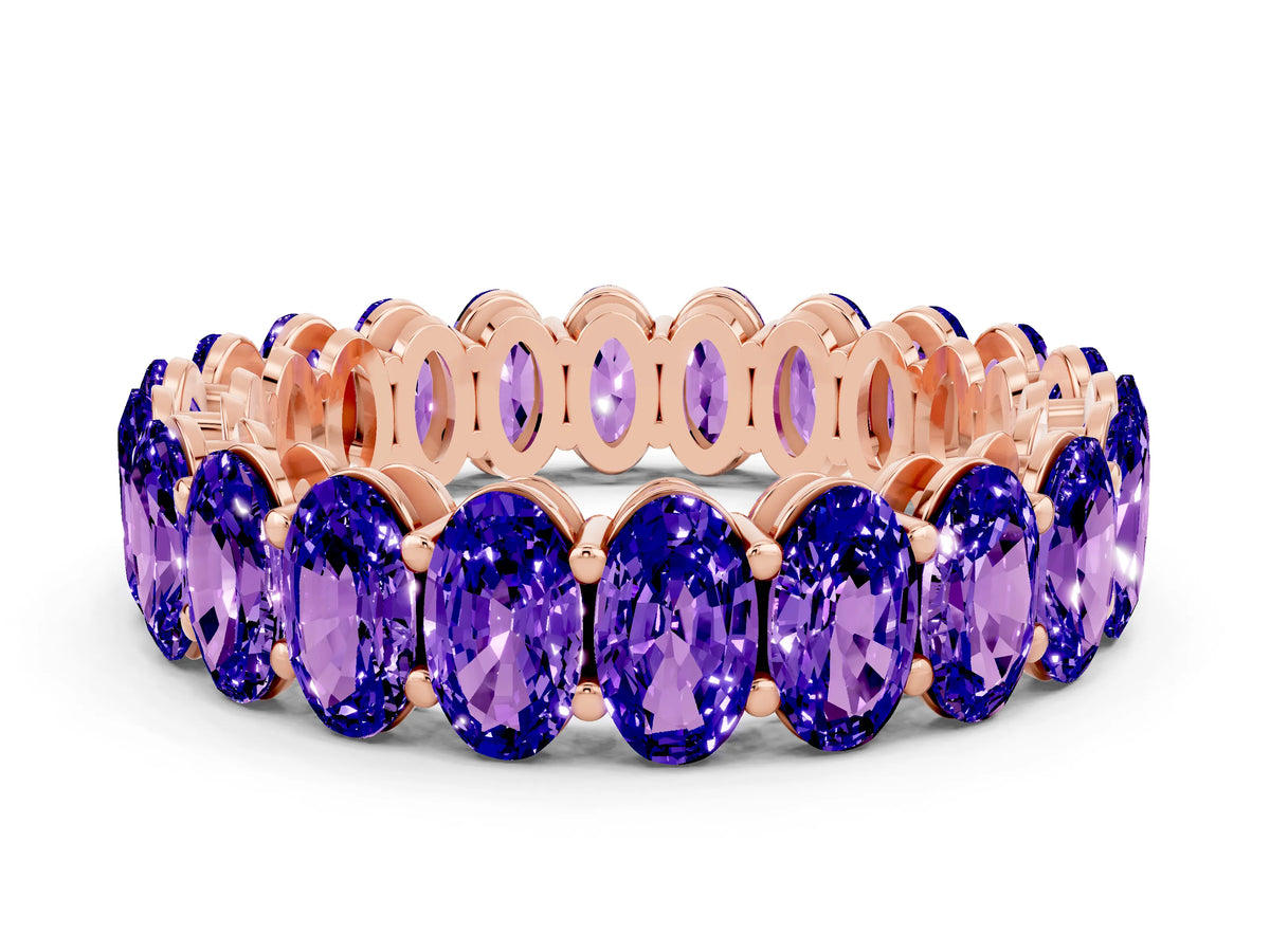 Oval Cut Tanzanite Eternity Band in Rose gold with Shared Prong Setting