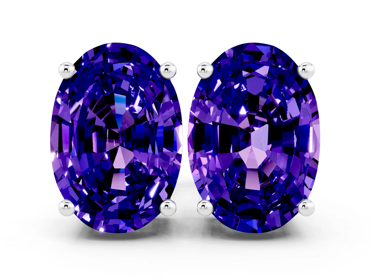 Oval Cut Tanzanite Stud Earrings in White gold with Basket Setting