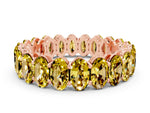 Oval Cut Yellow Sapphire Eternity Band in Rose gold with Shared Prong Setting