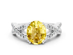 Oval Cut Yellow Sapphire Solitaire Ring in Silver with Interwoven Pavé Band and Prong Setting_6